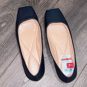 Navy blue flats with gold detailing